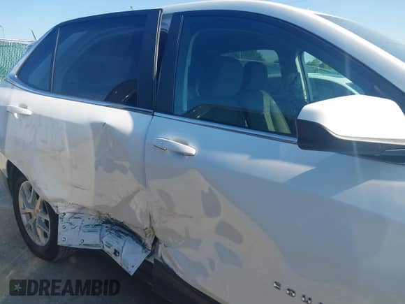 2022 Chevrolet Equinox LT with VIN 3GNAXUEV4NL245087, listed as a IAAI auction lot 43186613 with 55,753 mi miles and . Bid and sale history available at DreamBid. Image 6.