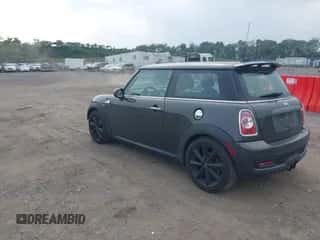 2011 MINI Hardtop S with VIN WMWSV3C58BTY13412, listed as a IAAI auction lot 42516587 with 124,831 mi miles and . Bid and sale history available at DreamBid. Image 3.