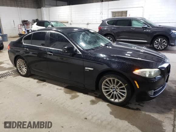 2011 BMW 5 Series 535i xDrive with VIN WBAFU7C55BC869786, listed as a Copart auction lot 57799775 with 201,267 mi miles and Non repairable. Bid and sale history available at DreamBid. Image 4.
