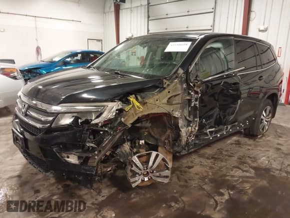 2016 Honda Pilot EX-L z VIN 5FNYF6H55GB008742, wystawiony jako IAAI lot #43188658 z przebiegiem 198 178 mil mil oraz . Historia ofert i sprzedaży dostępna na DreamBid. Obrazek 22.