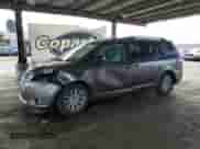 2014 Toyota Sienna Limited with VIN 5TDDK3DC9ES075981, listed as a Copart auction lot 84604665 with 97,797 mi miles and Salvage title. Bid and sale history available at DreamBid. Image 1.