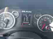 2025 Ram 1500 Tradesman with VIN 1C6RREGGXSN634409, listed as a IAAI auction lot 42945287 with 5,990 mi miles and . Bid and sale history available at DreamBid. Image 7.