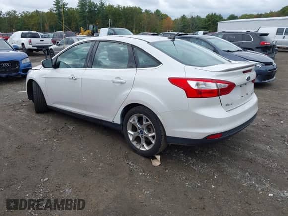 2014 Ford Focus Titanium with VIN 1FADP3J27EL215076, listed as a IAAI auction lot 43442107 with 137,959 mi miles and . Bid and sale history available at DreamBid. Image 3.