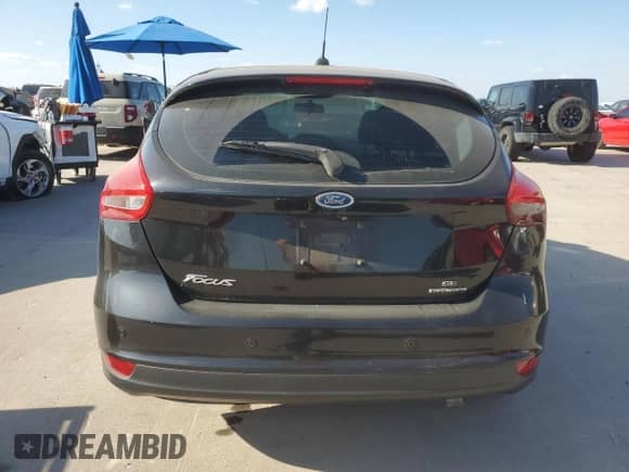 2015 Ford Focus SE z VIN 1FADP3K20FL210432, wystawiony jako Copart lot #86124805 z przebiegiem 98 374 mil mil oraz Czysty tytuł • Clean title. Historia ofert i sprzedaży dostępna na DreamBid. Obrazek 6.