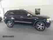 2012 Jeep Grand Cherokee Overland with VIN 1C4RJECG2CC290951, listed as a IAAI auction lot 42327217 with 122,108 mi miles and . Bid and sale history available at DreamBid. Image 14.