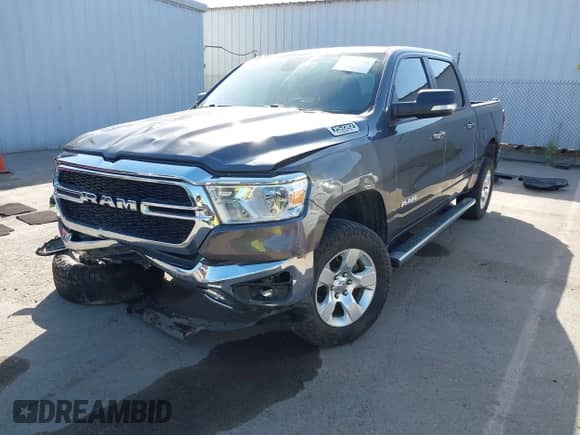2022 Ram 1500 Big Horn with VIN 1C6SRFFM6NN262828, listed as a IAAI auction lot 43383351 with 54,870 mi miles and . Bid and sale history available at DreamBid. Image 2.