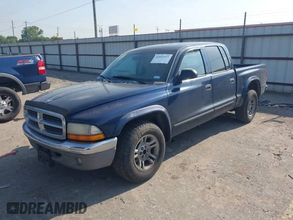 2004 Dodge Dakota SLT with VIN 1D7HL48K74S667977, listed as a IAAI auction lot 42051532 with 92,339 mi miles and . Bid and sale history available at DreamBid. Image 2.