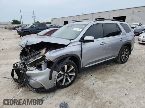 2024 Honda Pilot Touring с VIN 5FNYG2H74RB006524, выставлен на аукционе Copart как лот 64124825 с пробегом 35 569 миль миль и Списание • Salvage title. История ставок и продаж доступна на DreamBid. Изображение 1.