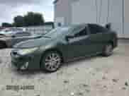 2012 Toyota Camry LE with VIN 4T4BF1FKXCR225658, listed as a Copart auction lot 84718865 with 212,136 mi miles and Salvage title. Bid and sale history available at DreamBid. Image 1.