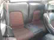 2006 Hyundai Tiburon GT z VIN KMHHN65F46U191990, wystawiony jako Copart lot #61887894 z przebiegiem 252 384 mil mil oraz Szkoda całkowita • Salvage title. Historia ofert i sprzedaży dostępna na DreamBid. Obrazek 10.