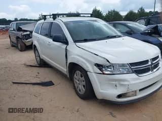 2014 Dodge Journey American Value with VIN 3C4PDCAB9ET166449, listed as a IAAI auction lot 43044943 with 106,279 mi miles and . Bid and sale history available at DreamBid. Image 1.