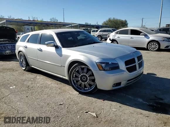 2006 Dodge Magnum R/T с VIN 2D8GV57286H122762, выставлен на аукционе Copart как лот 83399984 с пробегом 200 443 миль миль и Списание • Salvage title. История ставок и продаж доступна на DreamBid. Изображение 11.