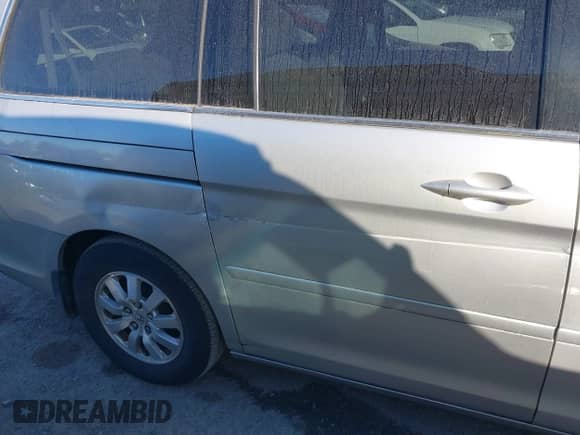 2008 Honda Odyssey EX z VIN 5FNRL38438B068846, wystawiony jako IAAI lot #43451580 z przebiegiem 185 466 mil mil oraz . Historia ofert i sprzedaży dostępna na DreamBid. Obrazek 14.