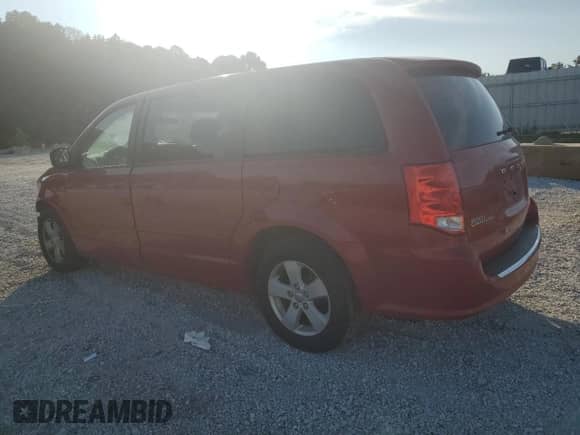 2013 Dodge Grand Caravan SE with VIN 2C4RDGBG2DR568129, listed as a Copart auction lot 71908235 with 110,135 mi miles and Salvage title. Bid and sale history available at DreamBid. Image 2.