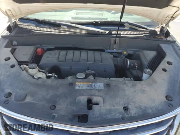 2014 Chevrolet Traverse LT z VIN 1GNKRHKD6EJ314659, wystawiony jako Copart lot #57835654 z przebiegiem Nie podano mil oraz Szkoda całkowita • Salvage title. Historia ofert i sprzedaży dostępna na DreamBid. Obrazek 12.