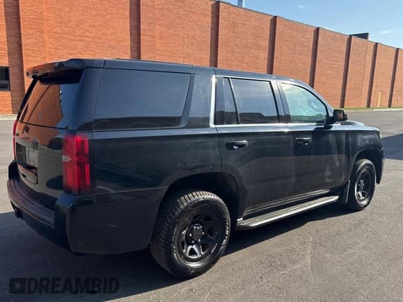 2016 Chevrolet Tahoe Commercial with VIN 1GNSKDEC0GR448085, listed as a Copart auction lot 80906745 with 277,149 mi miles and Clean title. Bid and sale history available at DreamBid. Image 4.