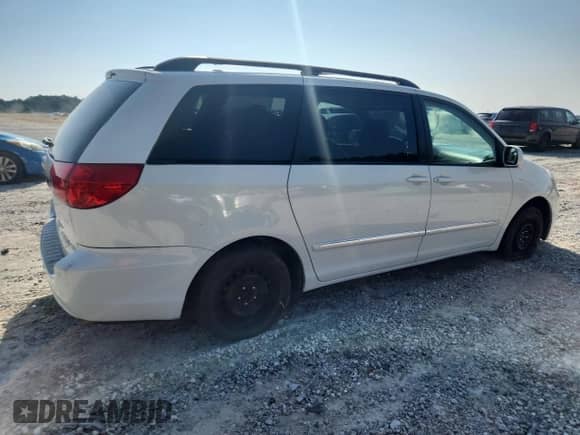 2010 Toyota Sienna XLE Limited с VIN 5TDYK4CC5AS300190, выставлен на аукционе Copart как лот 81425525 с пробегом 184 712 миль миль и Списание • Salvage title. История ставок и продаж доступна на DreamBid. Изображение 3.