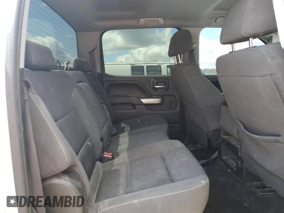 2017 Chevrolet Silverado 1500 LT with VIN 3GCUKREC8HG143580, listed as a Copart auction lot 68869605 with 156,515 mi miles and Salvage title. Bid and sale history available at DreamBid. Image 10.