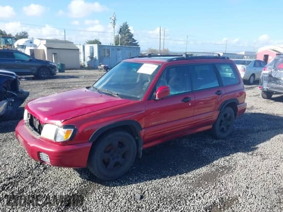 2002 Subaru Forester S with VIN JF1SF65662H713647, listed as a IAAI auction lot 43564108 with 236,560 mi miles and . Bid and sale history available at DreamBid. Image 2.