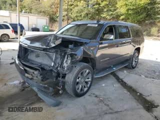 2016 Chevrolet Suburban LTZ with VIN 1GNSCJKC7GR291137, listed as a Copart auction lot 81284125 with 184,636 mi miles and Salvage title. Bid and sale history available at DreamBid. Image 1.