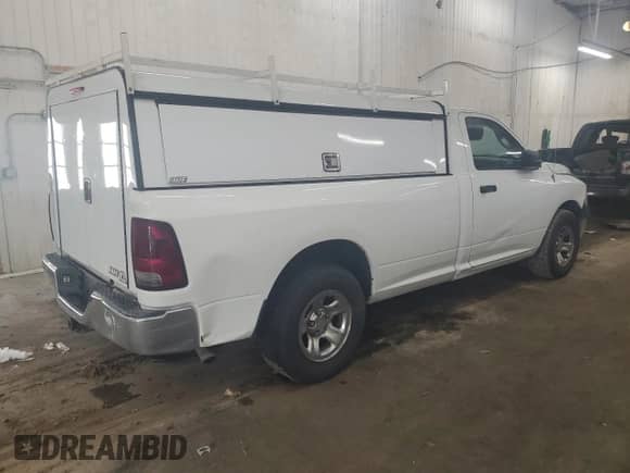 2012 Ram 1500 ST z VIN 3C6JD6DP2CG241309, wystawiony jako Copart lot #51840475 z przebiegiem 298 707 mil mil oraz Czysty tytuł • Clean title. Historia ofert i sprzedaży dostępna na DreamBid. Obrazek 3.