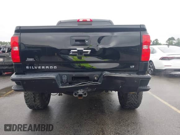 2018 Chevrolet Silverado 1500 LT z VIN 3GCUKREC6JG242601, wystawiony jako IAAI lot #43322873 z przebiegiem 84 104 mil mil oraz . Historia ofert i sprzedaży dostępna na DreamBid. Obrazek 6.