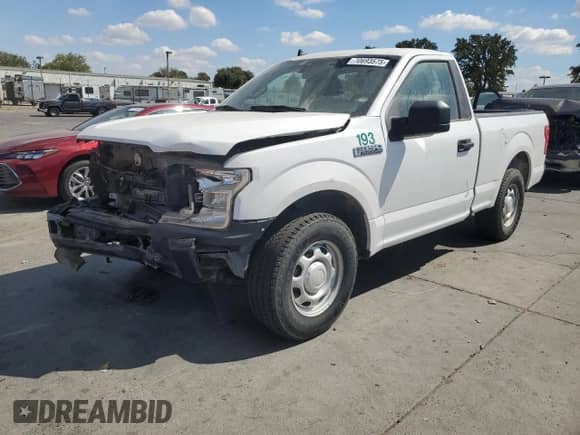 2020 Ford F-150 XL with VIN 1FTMF1CB2LKE26414, listed as a Copart auction lot 70693575 with 102,623 mi miles and Salvage title. Bid and sale history available at DreamBid. Image 1.