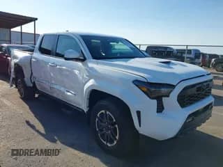 2024 Toyota Tacoma SR5 with VIN 3TMKB5FN0RM015790, listed as a IAAI auction lot 42909942 with 10,582 mi miles and . Bid and sale history available at DreamBid. Image 1.