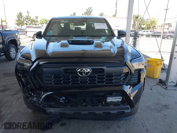2025 Toyota Tacoma SR5 with VIN 3TMKB5FN5SM034762, listed as a IAAI auction lot 42217544 with 1,127 mi miles and . Bid and sale history available at DreamBid. Image 13.