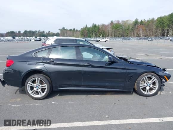 2015 BMW 4 Series 435i xDrive z VIN WBA4B3C55FGV48934, wystawiony jako IAAI lot #42098843 z przebiegiem 89 959 mil mil oraz . Historia ofert i sprzedaży dostępna na DreamBid. Obrazek 12.