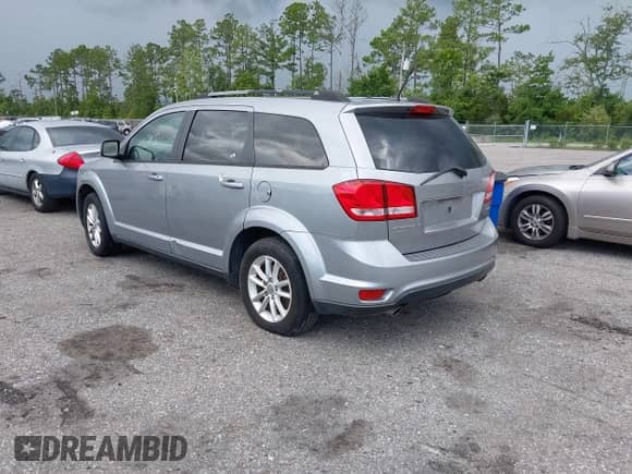 2017 Dodge Journey SXT with VIN 3C4PDDBG3HT618366, listed as a IAAI auction lot 42762985 with 209,240 mi miles and . Bid and sale history available at DreamBid. Image 3.