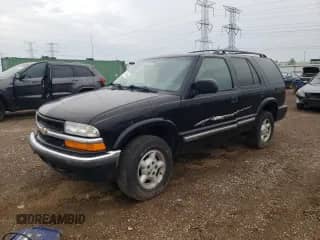 2000 Chevrolet Blazer LS z VIN 1GNDT13W1Y2112487, wystawiony jako Copart lot #63741485 z przebiegiem 270 945 mil mil oraz Szkoda całkowita • Salvage title. Historia ofert i sprzedaży dostępna na DreamBid. Obrazek 1.