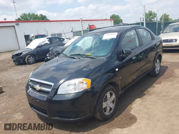 2007 Chevrolet Aveo LS with VIN KL1TD56627B055436, listed as a IAAI auction lot 42462092 with 102,923 mi miles and . Bid and sale history available at DreamBid. Image 12.