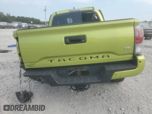 2023 Toyota Tacoma SR5 with VIN 3TYDZ5BN7PT020108, listed as a Copart auction lot 81069145 with 27,371 mi miles and Salvage title. Bid and sale history available at DreamBid. Image 6.