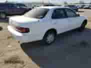 1992 Toyota Camry LE с VIN 4T1SK12E0NU064956, выставлен на аукционе Copart как лот 50665925 с пробегом 228 909 миль миль и Списание • Salvage title. История ставок и продаж доступна на DreamBid. Изображение 3.