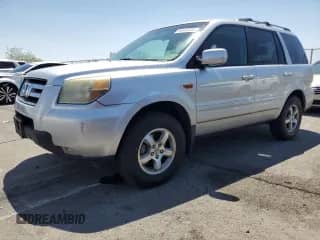 2006 Honda Pilot EX-L z VIN 5FNYF285X6B015936, wystawiony jako Copart lot #60643035 z przebiegiem 130 654 mil mil oraz Szkoda całkowita • Salvage title. Historia ofert i sprzedaży dostępna na DreamBid. Obrazek 1.