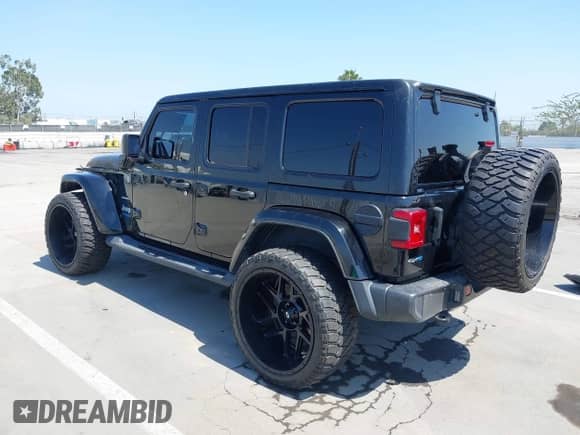 2021 Jeep Wrangler Unlimited Sahara with VIN 1C4JJXP66MW704694, listed as a IAAI auction lot 42615860 with Not provided miles and . Bid and sale history available at DreamBid. Image 3.