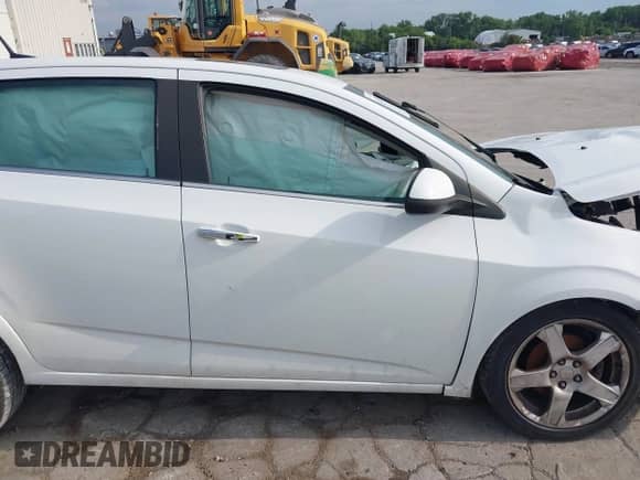 2013 Chevrolet Sonic LTZ with VIN 1G1JE6SB7D4203157, listed as a IAAI auction lot 42857551 with 110,001 mi miles and . Bid and sale history available at DreamBid. Image 13.
