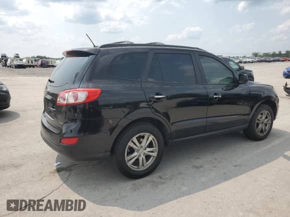 2012 Hyundai Santa Fe Limited z VIN 5XYZK4AG9CG107132, wystawiony jako Copart lot #60558455 z przebiegiem 189 403 mil mil oraz Szkoda całkowita • Salvage title. Historia ofert i sprzedaży dostępna na DreamBid. Obrazek 3.