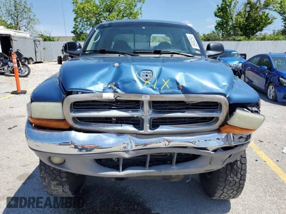 2004 Dodge Dakota SLT z VIN 1D7HG48N24S563945, wystawiony jako Copart lot #55990595 z przebiegiem 169 684 mil mil oraz Szkoda całkowita • Salvage title. Historia ofert i sprzedaży dostępna na DreamBid. Obrazek 5.