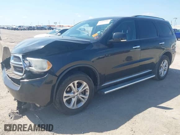 2013 Dodge Durango Crew with VIN 1C4RDHDG4DC650990, listed as a IAAI auction lot 43011286 with 159,642 mi miles and . Bid and sale history available at DreamBid. Image 2.