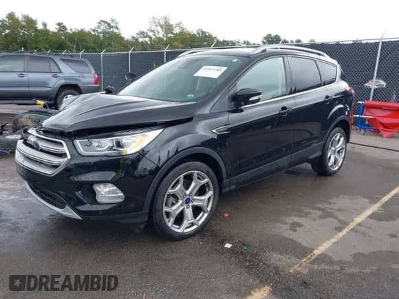 2017 Ford Escape Titanium с VIN 1FMCU0J95HUA75324, выставлен на аукционе IAAI как лот 43363180 с пробегом 85 525 миль миль и . История ставок и продаж доступна на DreamBid. Изображение 17.