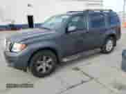 2010 Nissan Pathfinder SE with VIN 5N1AR1NB9AC607519, listed as a Copart auction lot 87106095 with 169,231 mi miles and Salvage title. Bid and sale history available at DreamBid. Image 1.