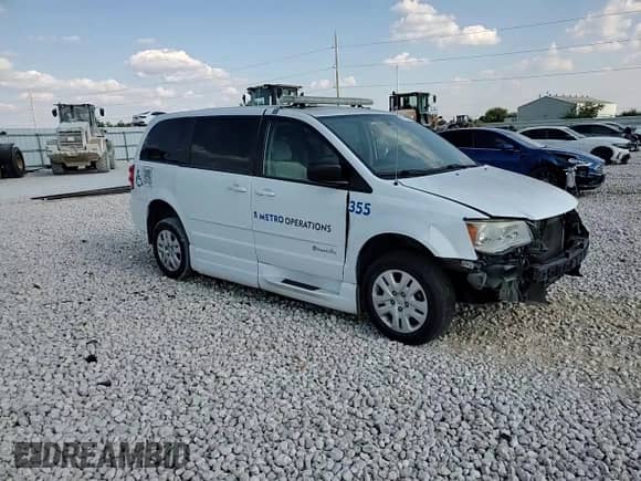 2017 Dodge Grand Caravan SE with VIN 2C7WDGBG9HR802259, listed as a Copart auction lot 68463275 with 136,353 mi miles and Salvage title. Bid and sale history available at DreamBid. Image 15.