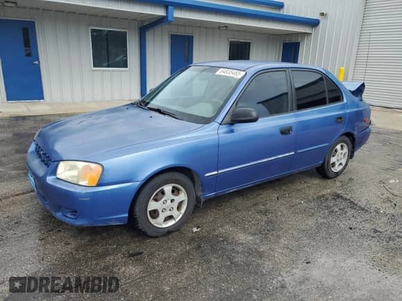 2002 Hyundai Accent GL z VIN KMHCG45C52U288494, wystawiony jako Copart lot #64835465 z przebiegiem 124 538 mil mil oraz Szkoda całkowita • Salvage title. Historia ofert i sprzedaży dostępna na DreamBid. Obrazek 1.