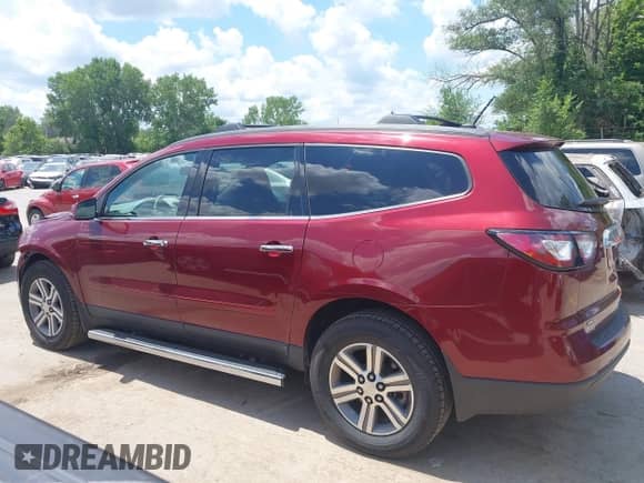 2015 Chevrolet Traverse LT with VIN 1GNKVHKD8FJ380773, listed as a IAAI auction lot 42647584 with 106,932 mi miles and . Bid and sale history available at DreamBid. Image 14.