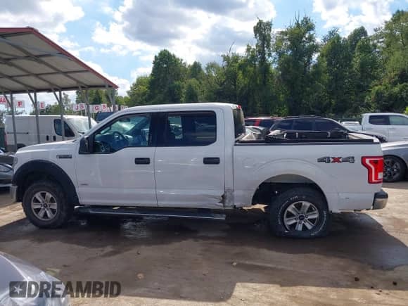 2016 Ford F-150 XLT z VIN 1FTEW1EGXGFC30765, wystawiony jako IAAI lot #43377680 z przebiegiem 141 180 mil mil oraz . Historia ofert i sprzedaży dostępna na DreamBid. Obrazek 14.
