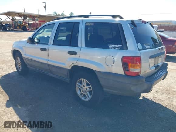 2004 Jeep Grand Cherokee Laredo with VIN 1J4GX48S54C401873, listed as a IAAI auction lot 43337181 with 274,149 mi miles and . Bid and sale history available at DreamBid. Image 3.