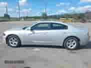 2019 Dodge Charger SXT with VIN 2C3CDXBG0KH695250, listed as a IAAI auction lot 43240697 with 120,324 mi miles and . Bid and sale history available at DreamBid. Image 14.