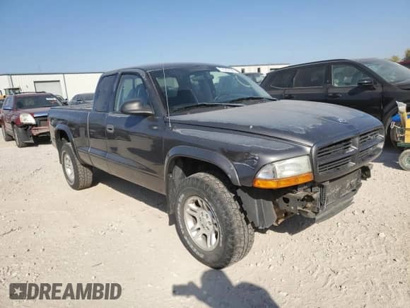 2003 Dodge Dakota с VIN 1D7HG12XX3S110986, выставлен на аукционе Copart как лот 77675734 с пробегом 108 529 миль миль и Списание • Salvage title. История ставок и продаж доступна на DreamBid. Изображение 4.